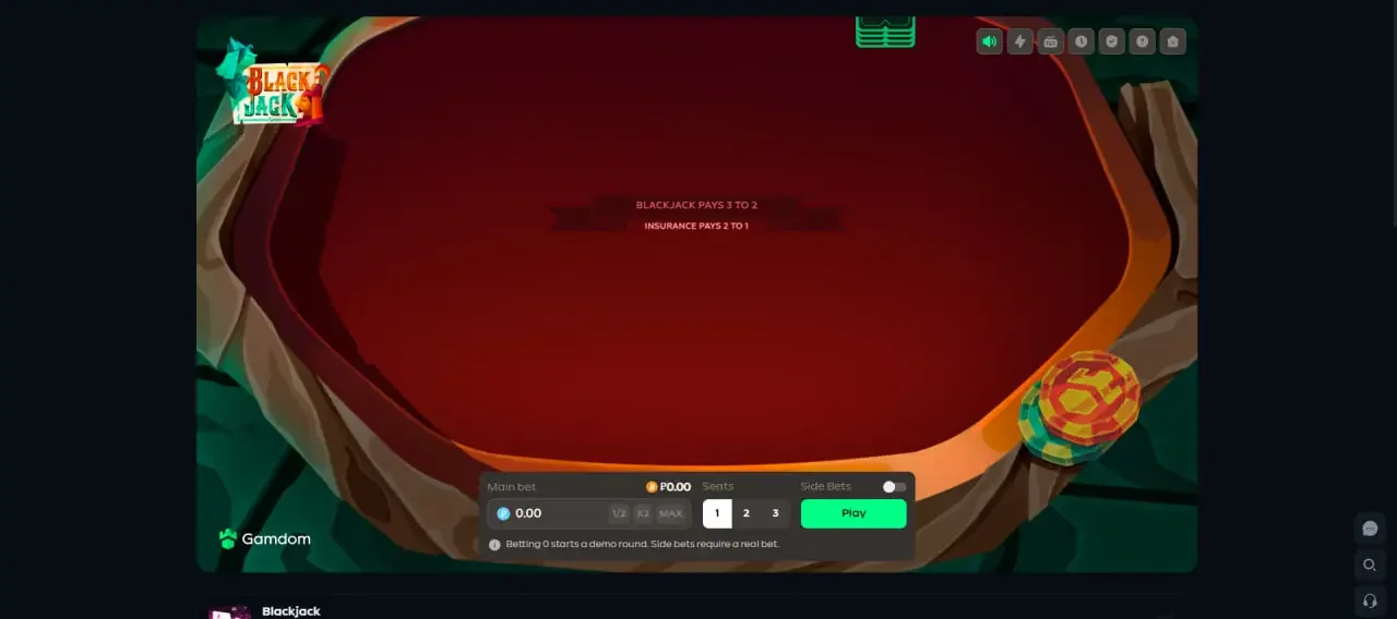 Gamdom blackjack table with the main bet field, seat selector, side bets toggle and a green Play button below the felt